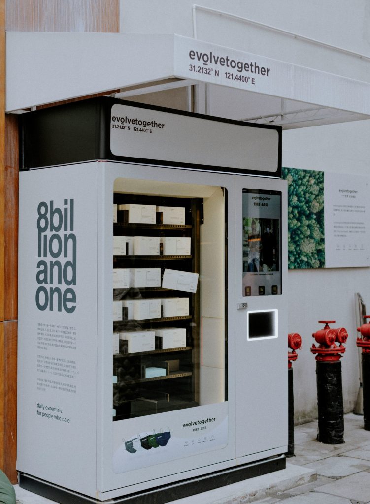 a vending machine sitting on the side of a building