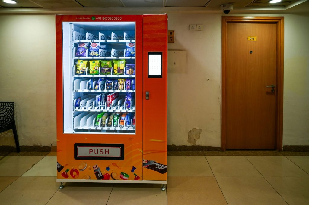 A vending machine sells snacks and drinks.