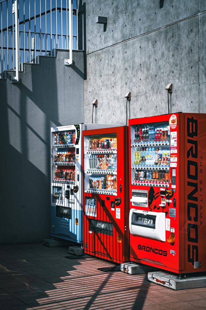 a row of vending machines sitting next to each other